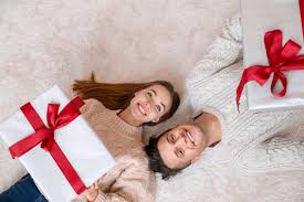 Cute little gift ideas for the female cute little gift ideas for the female traveler in your life. Photo Christmas Brown Haired Men Smile 2 Young Woman Gifts Staring