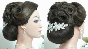 Bridal hairstyle for long hair tutorial. Trendy wedding updo.