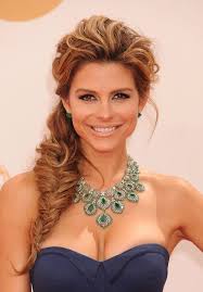With this fun style, loose and curly braids are tied up into a knot on the top of here's a unique variation of the popular topknot style. Side Braids