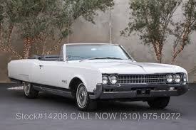 Image result for Champagne Mist 1966 Oldsmobile