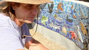 Mosaic wall' going in at Center for Land-Based Learning one tile at a time 