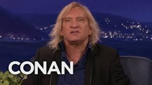 Joe walsh performing his most unfavourite song but the fans do love i, including myself: That Time Joe Walsh John Belushi Trashed A Penthouse Conan On Tbs Youtube