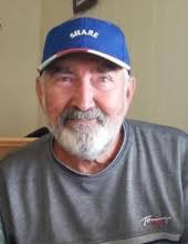 Obituary information for James "Shake" Rezabek Jr.