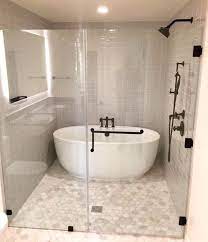 Do you think i will stay warmer if the glass piece goes all the way to the ceiling? Tub Inside Shower Design Ideas Tub Inside Shower Bathroom Remodel Shower Bathroom Tub Shower Combo