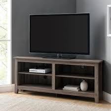 These television stands provide a sturdy surface for displaying a tv and storage space for av components like conventional furnishings but are designed to fit out of the way in the open space in the corner of a room. Corner Unit Tv Stands Living Room Furniture The Home Depot