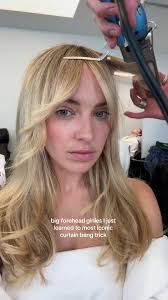 Hairstyles for Big Forehead with Curtain Bangs