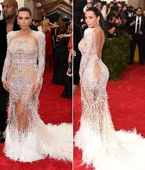 Smoky eyes and thick black eyeliner. Photos Kim Kardashian S Met Gala Dress Stuns In Backless Cavalli Hollywood Life