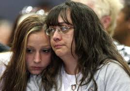 Memorial for girl in suitcase draws thousands