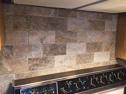 Fill in the space using the grout and allow it to dry. White Travertine Backsplash Images Jobsatbournemouth Com