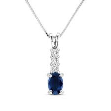 Oval Blue Sapphire And 1 10 Ct T W Diamond Pendant In 14k White Gold Zales Clear Crystal Necklace Diamond Pendant Sapphire Diamond Necklace