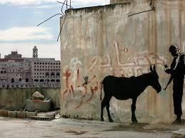 This opens in a new window. Banksy Malt Krankenschwester Als Superheldin