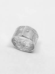 Maybe you would like to learn more about one of these? Wide Sterling Silver Floral Pattern Ring Felt
