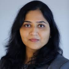 Sharing a proud moment with Jalpa Patel, CFA. At left is Jalpa sharing her  insights