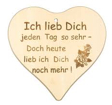 Ich liebe dich bild 5 der text gestrickt in rot und weiss auf jeansstoff hintergrund! Herzbrett Ich Liebe Dich