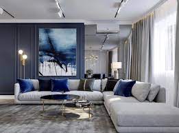 Check out the most attractive ideas to decorate your living room with grey and blue tones here! Gorgeous Grey And Blue Living Room Decor With Blue Art And Grey Sectional Art Blue Blue Living Room Decor Living Room Decor Gray Living Room Design Decor