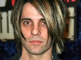 What religion is Criss Angel?