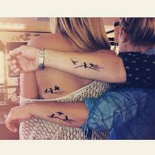 Birds Flying Away Tattoo Meaning Aunt Mother And Daughter Tattoo Each One Is A Different Bird Flying Away Tattoo Tattoos L Littlet Tattoos For Daughters Mother Tattoos Family Tattoos