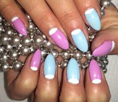 Sharper than ovals but less dangerous than stilettos. Light Blue Almond Nails