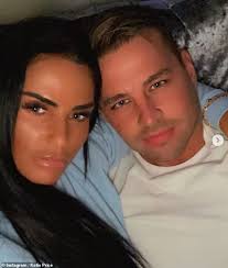 Katie Price reveals that she is engaged to her boyfriend, Carl Woods while 