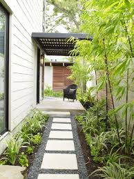 Vertical Gardening Brings Plants To New Heights Up Bring Garden Vertical Gardening Brings Side Yard Landscaping Pathway Landscaping Modern Front Yard