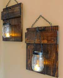 In this diy pallet wall hanging planter project we have used some home empty mason jars and a plane pallet shelf. Homedecor Palletcandleholder Partydecor Recyclingwoodpallets Wallsconce I Saw These Rustic Pallet Sc Pallet Home Decor Pallet Candle Pallet Wall Decor