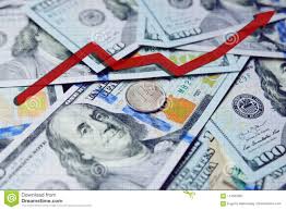 Red Arrow Chart On The Background Of Hundred Dollar Bills