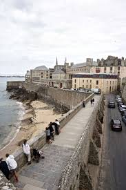 A Guide To Visiting Saint Malo In Brittany France Everything You Should See And Do In The Region Ancient Ramparts Saint Malo France Travel Brittany France