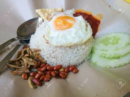 It is also the native dish in neighbouring areas with significant malay populations such as singapore, brunei. Nasi Lemak Served With Sambal Half Fried Egg Ikan Bilis Fried Stock Photo Picture And Royalty Free Image Image 96515971