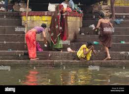 Women after bathing in The Holy Ganges River Stock Photo - Alamy