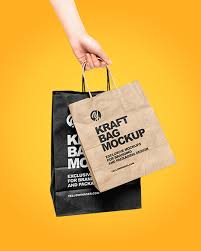 Download Hand W Two Paper Bags Mockup In Bag Sack Mockups On Yellow Images Object Mockups PSD Mockup Templates
