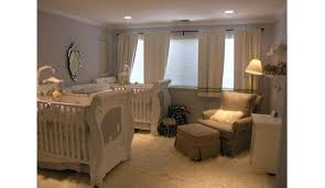 Grey and white modern farmhouse twin nursery with beaded chandelier, grey cribs and animal head wall decor mounts #nurseryideas #nurserydecor #babynursery #nursery #twinnursery. Gender Neutral Nursery Home Garden Design Ideas Articles
