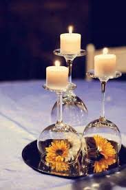 24 Clever Things To Do With Wine Glasses Simple Centerpieces Wedding Centerpieces Centerpieces