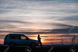 Your sunset road trip stock images are ready. Man Standing Near Car On Sunset Car Travel Concept Road Trip Stock Photo Picture And Royalty Free Image Image 139556546