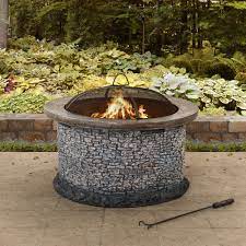 A fire pit is one type of outdoor fire feature that is an inexpensive, easy way to add a lot more fun to your backyard. Sunjoy Stone 32 Inch Lightweight Round Wood Burning Firepit On Sale Overstock 30722762