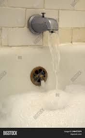 Temperatures can be adjusted by controlling the volume of water flowing through each water line with. Bathtub Water Faucet Image Photo Free Trial Bigstock