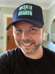 My new Seattle Kraken hat just arrived!!!!!!! How do I look?!?!?