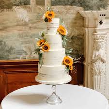 How could a wedding reception along the seaside be so gorgeous and romantic ! 14 Sunflower Wedding Cake Ideas
