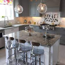 The yellow lets the island stand on its own against the swath of white walls and cabinets. Remodelaholic Grey And White Kitchen Cabinet Ideas