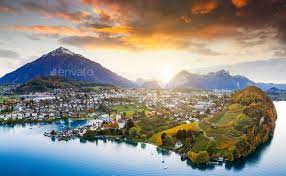 vineyards with spiez castle in spiez in the bernese oberland of switzerland in 2021 spiez travel usa switzerland
