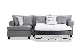 A sectional sleeper sofa is one of the best purchases you can make for your home when you need extra seating, but it's also a great choice when you need a place for overnight guests to sleep. Laurel Gray 2 Piece Left Arm Facing Sleeper Sectional Bob S Discount Furniture