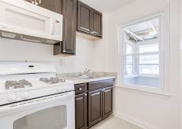 The kitchen features cliqstudios cabinets in the lyndale style in painted white finish. 3825 Lyndale Ave Belair Edison Baltimore Md