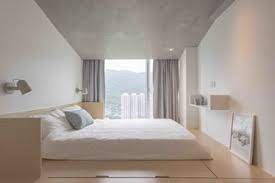 The faux marble finish creates elegant texture on the piece. Here S How To Put Your Bed On The Floor Without It Looking Sloppy Dwell