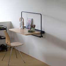 This wall mounted foldable desk is designed to provide ample working space without eating too much floor space in your home office. Foldable Wall Desk Made Of Metal And Oak Wood By Designbite