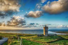 This castle stands alone in the vast field. Doonagore Castle The Doolin Tower That Saw 170 Murders