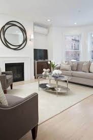 Gorgeous living room with large windows and a high ceiling. 24 Townhouse Living Room Ideas Photos