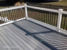 Black Aluminum Deck Railing Ideas Composite Deck Using Fiberondecking Castle Grey Decking With White Pvc Railing And Black Square Aluminum Baluste Deck Railings Decks Backyard Building A Deck