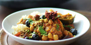 This is a good way to prepare sausages for barbecues in advance, and they tend to come out better even if you're not a great barbecue chef. Andrew Zimmern Cooks Chicken Merguez Sausage Artichoke Tagine