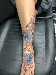 Lily Tattoo Lilies Foot Ankle Tattoo Stars Leg Calf Tattoos Ankle Foot Tattoo Ankle Tattoo Designs Foot Tattoos For Women