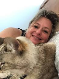 Can anyone tell me this kitties name? I see her all the time around my  house and she is friendly. I would just like to call her by name when I see