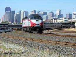 Jpbx 923 Baby Bullet Train With Sf Skyline Caltrain Photograph By Wernher Krutein